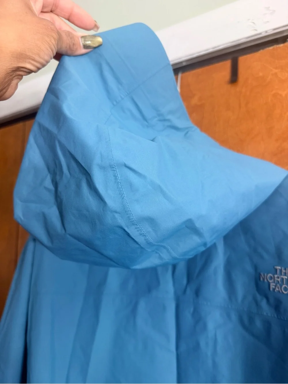 The North Face Men’s Sky Blue Hooded Rain Jacket
